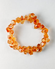Orange crystal bracelet on a white background